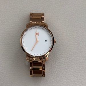 MVMT gold women watch small wrist band
